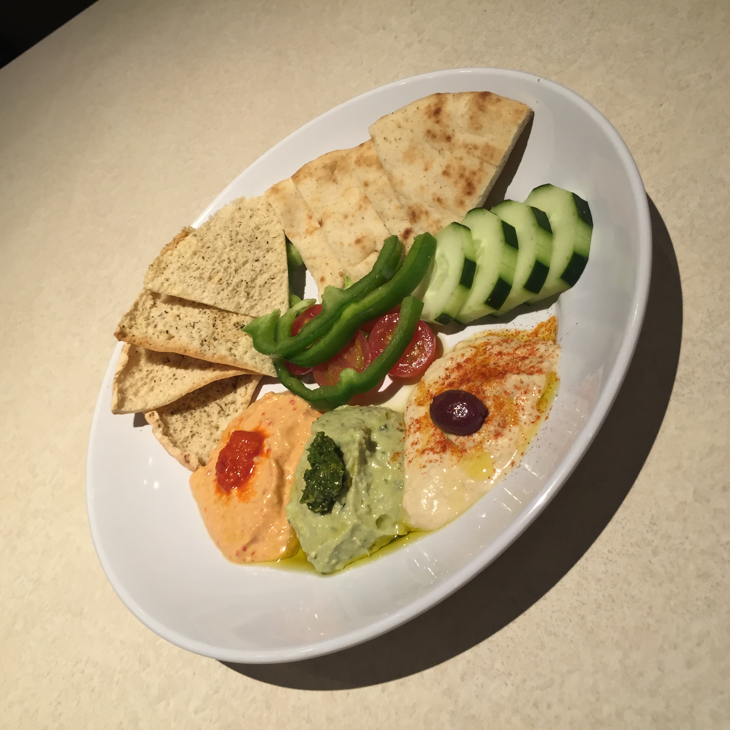 Zoes Kitchen Adds New Entree And More Hummus Options To Its Menu